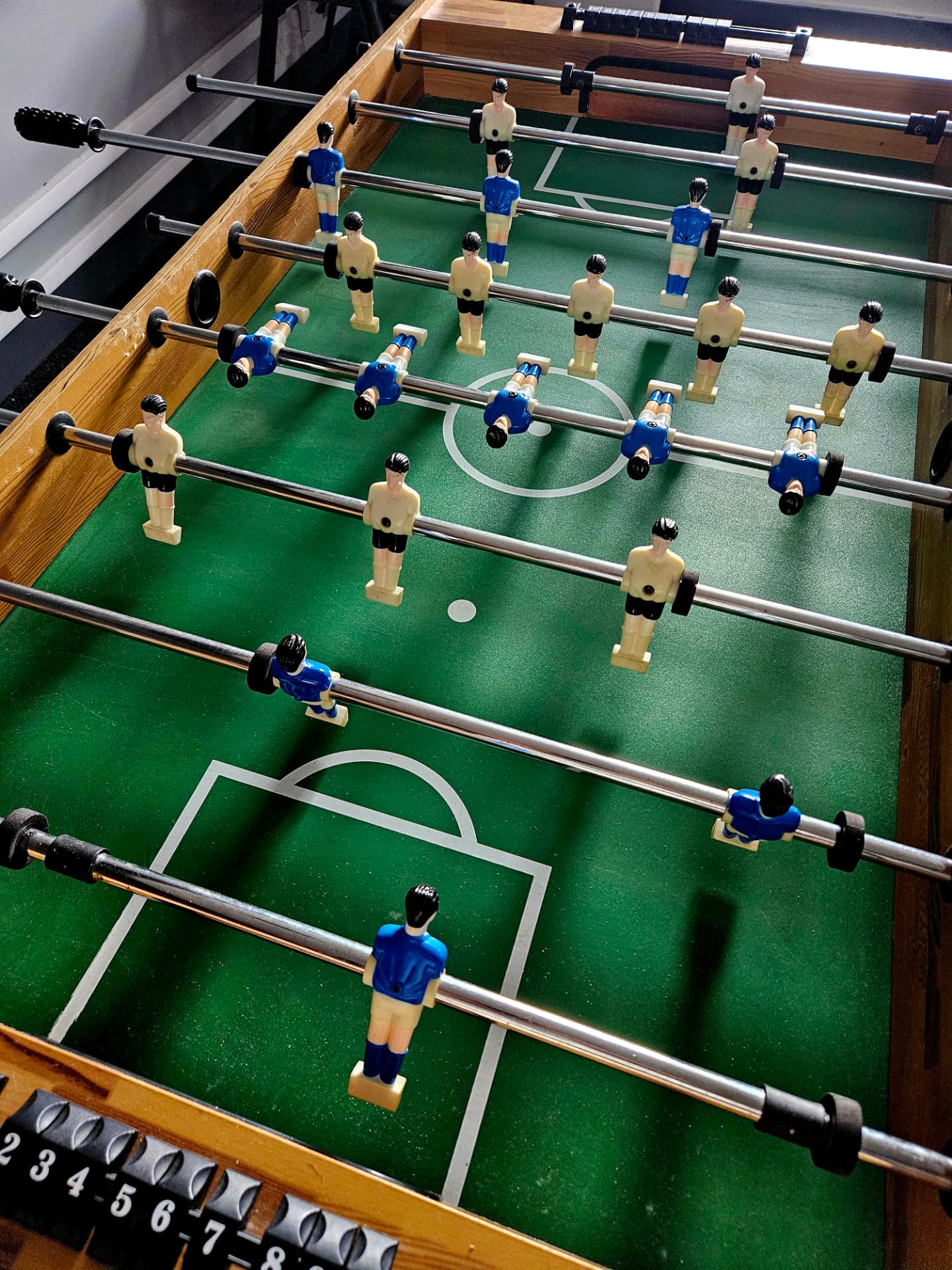 A table football game used for social play and turn-taking